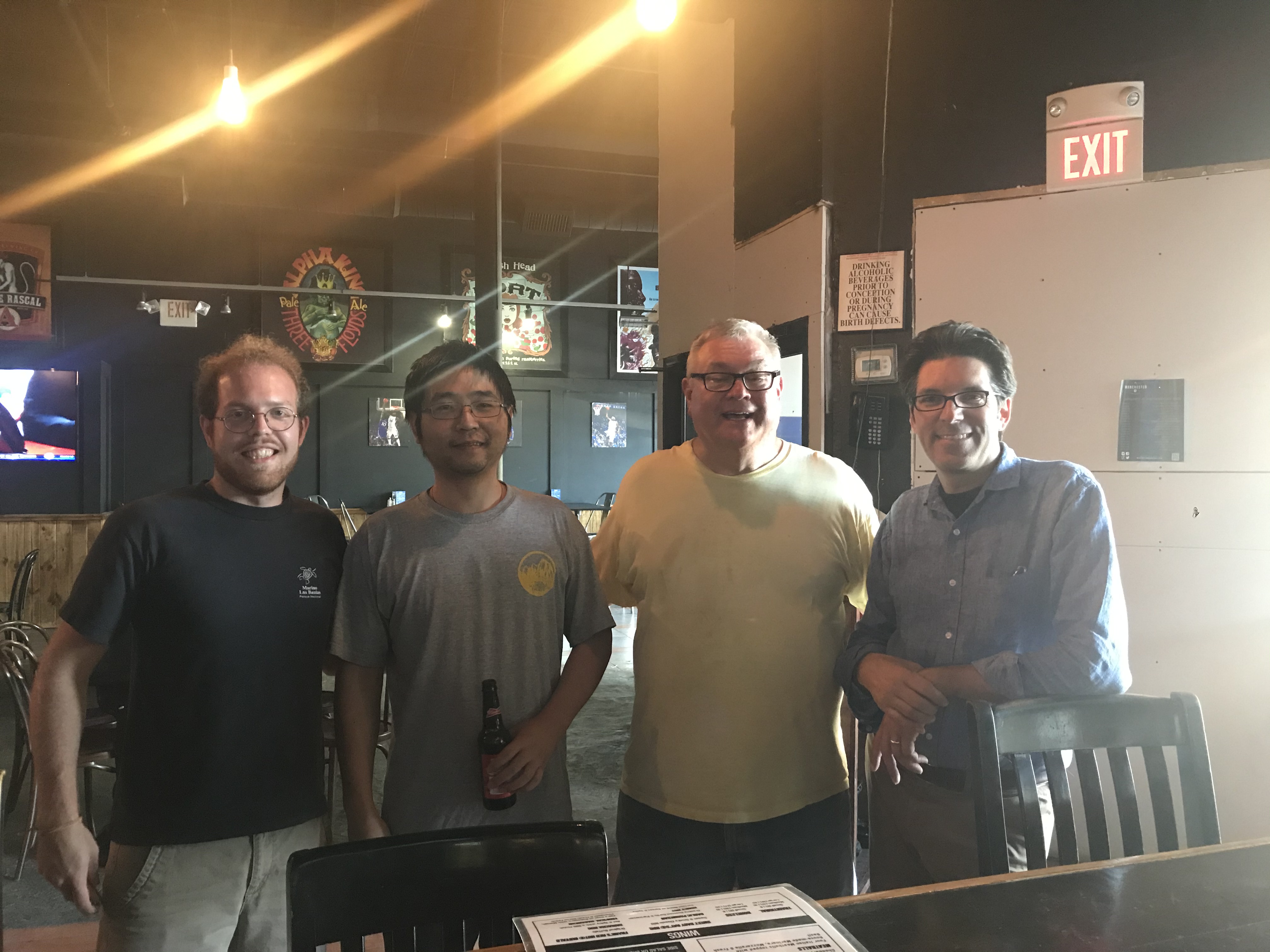 M.S. student Matthew Ruffner, Ph.D. student Ying Yu, and Dr. Lau with a fellow graduate student
